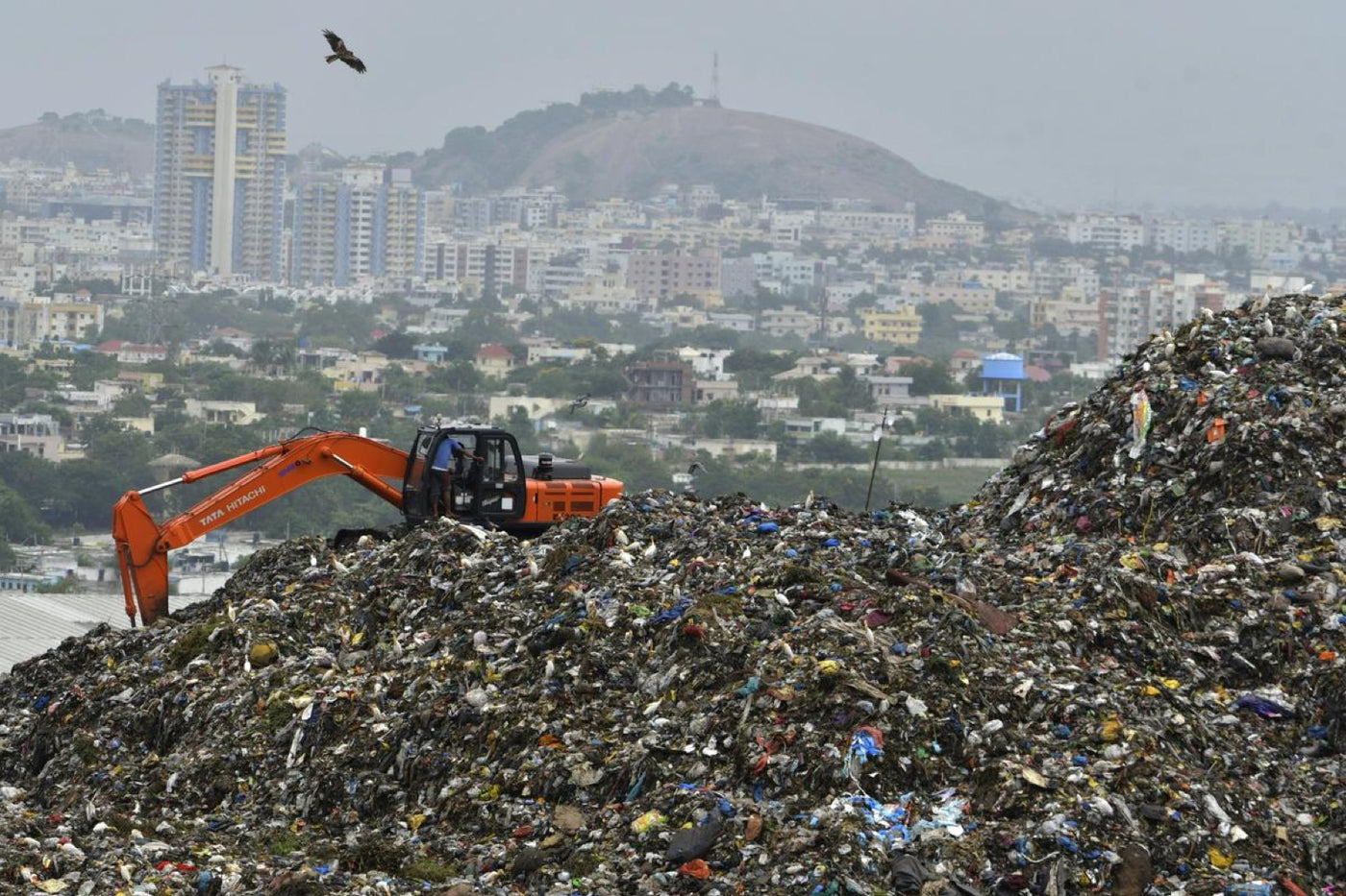 Workers sorting low-value plastic waste in Hyderabad, India