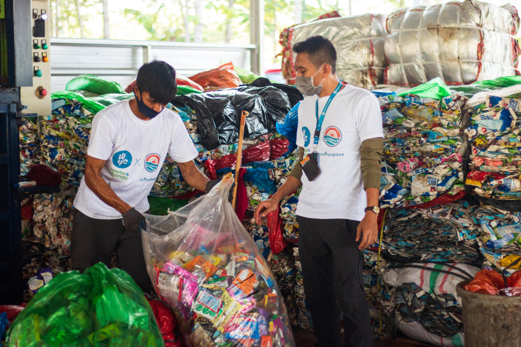 rePurpose Global collection workers sorting low-value plastic waste